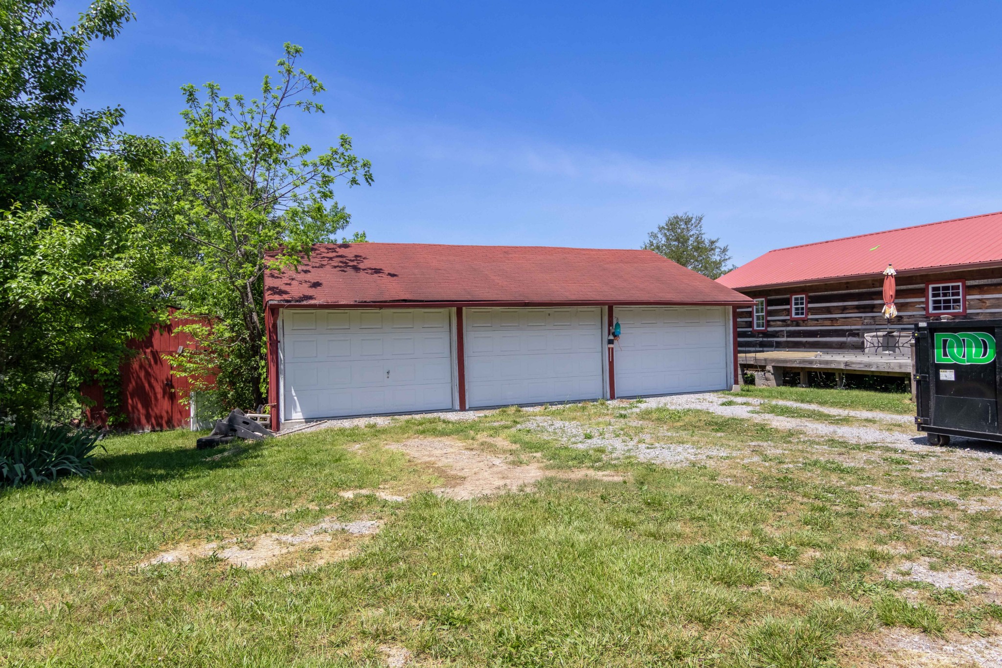 6323 Bethlehem Road Springfield, TN 37172 - Photo 8 of 30 a backyard of a house with lots of green space