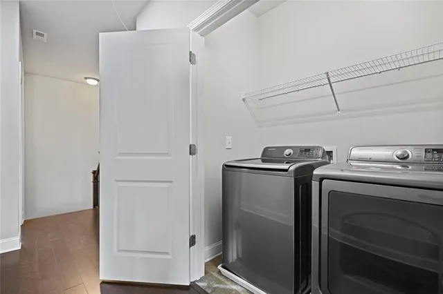 a utility room with dryer and washer