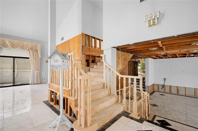 a large white bed in a room
