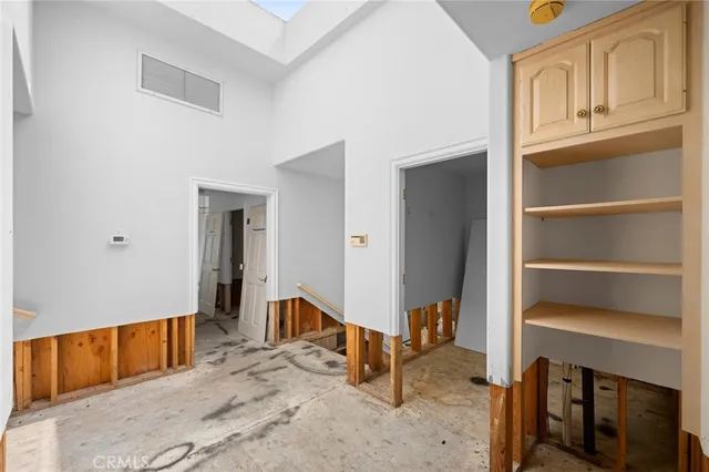 a large white building with glass windows