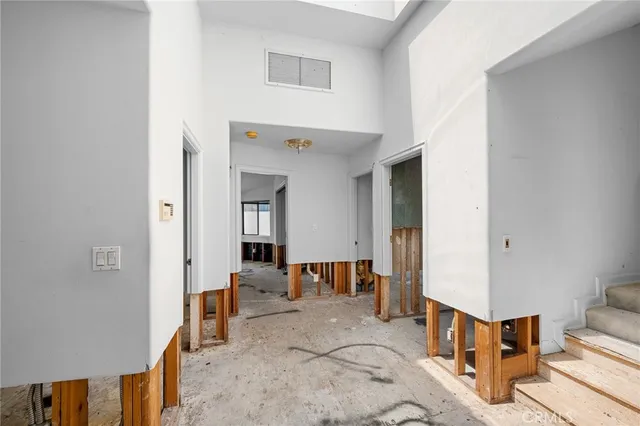 a bathroom with a shower and a sink