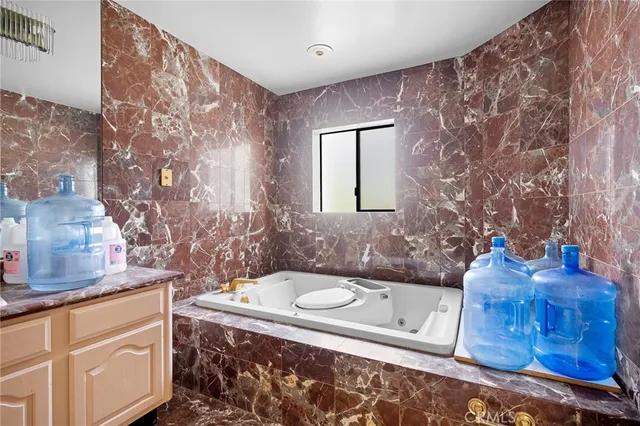 a view of a swimming pool with a yard