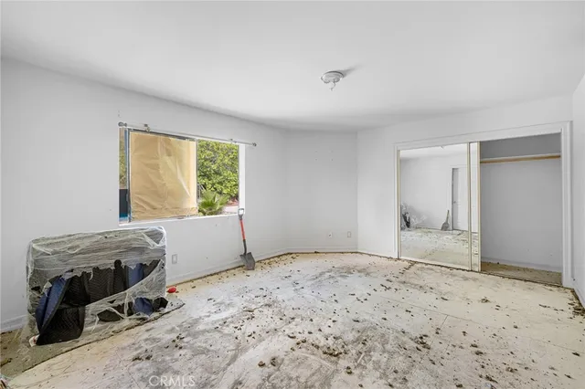 a view of a house with swimming pool and porch