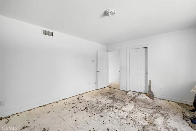 a swimming pool with outdoor seating and yard