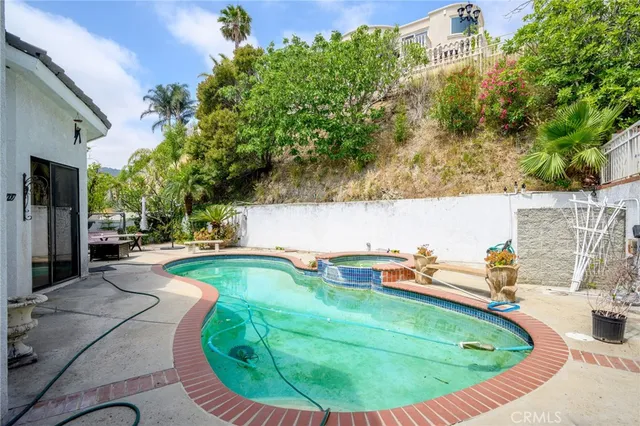 a view of a backyard with a patio