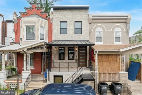 a front view of a house with a balcony