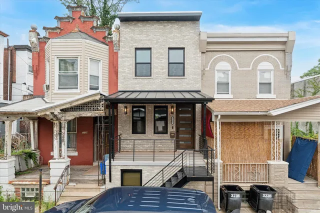 a front view of a house with a balcony