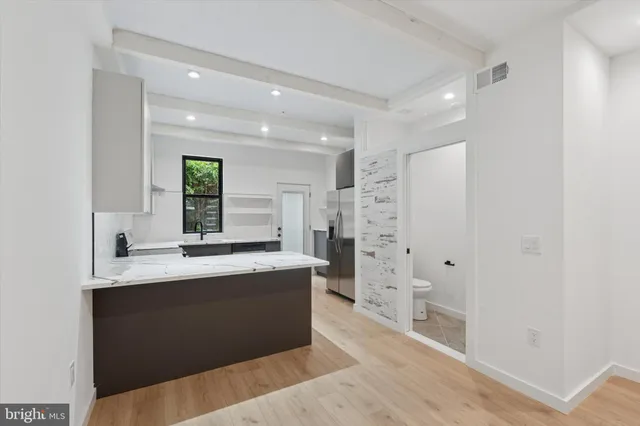 a view of kitchen with sink