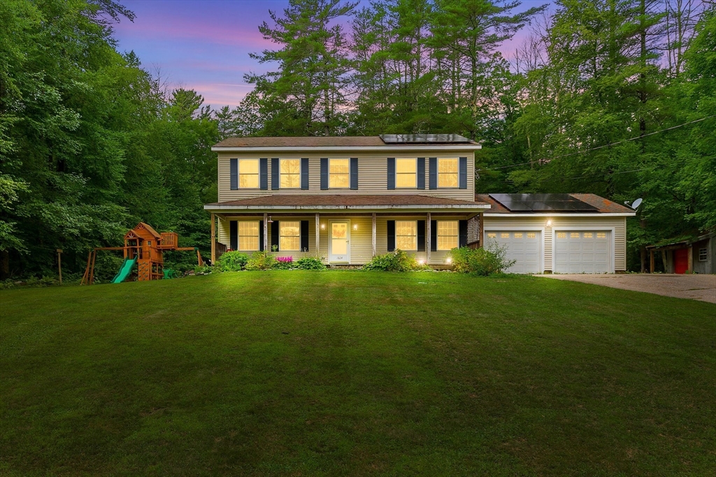 a house view with a garden space