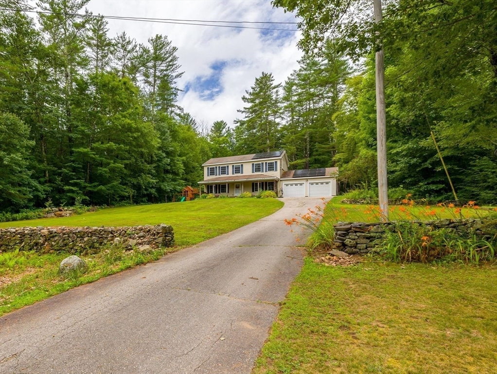 1824 Greenwich Road Hardwick, MA 01082 - Photo 3 of 41 a view of a swimming pool with a garden