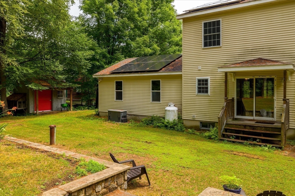 1824 Greenwich Road Hardwick, MA 01082 - Photo 31 of 41 a view of a house with pool and a yard