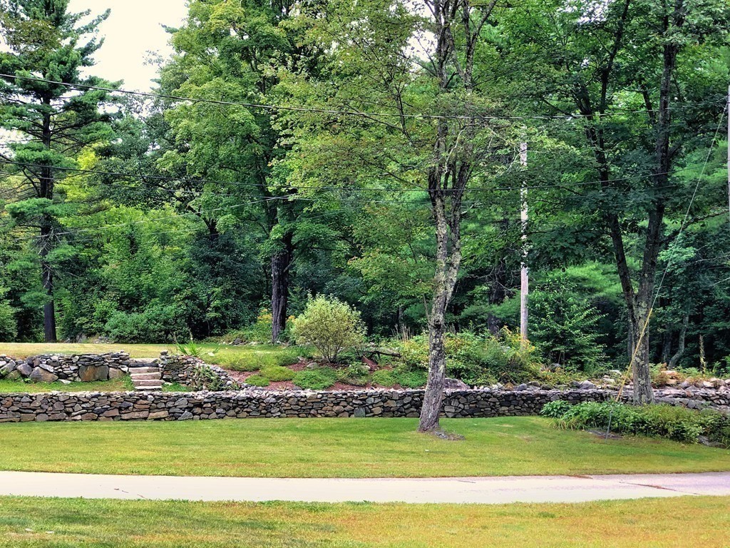 1824 Greenwich Road Hardwick, MA 01082 - Photo 36 of 41 a view of a swimming pool with lawn chairs and large trees