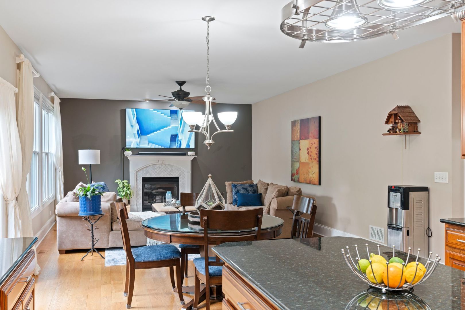 106 Forest View Drive Lake Bluff, IL 60044 - Photo 15 of 56 a living room with furniture a chandelier and a fireplace