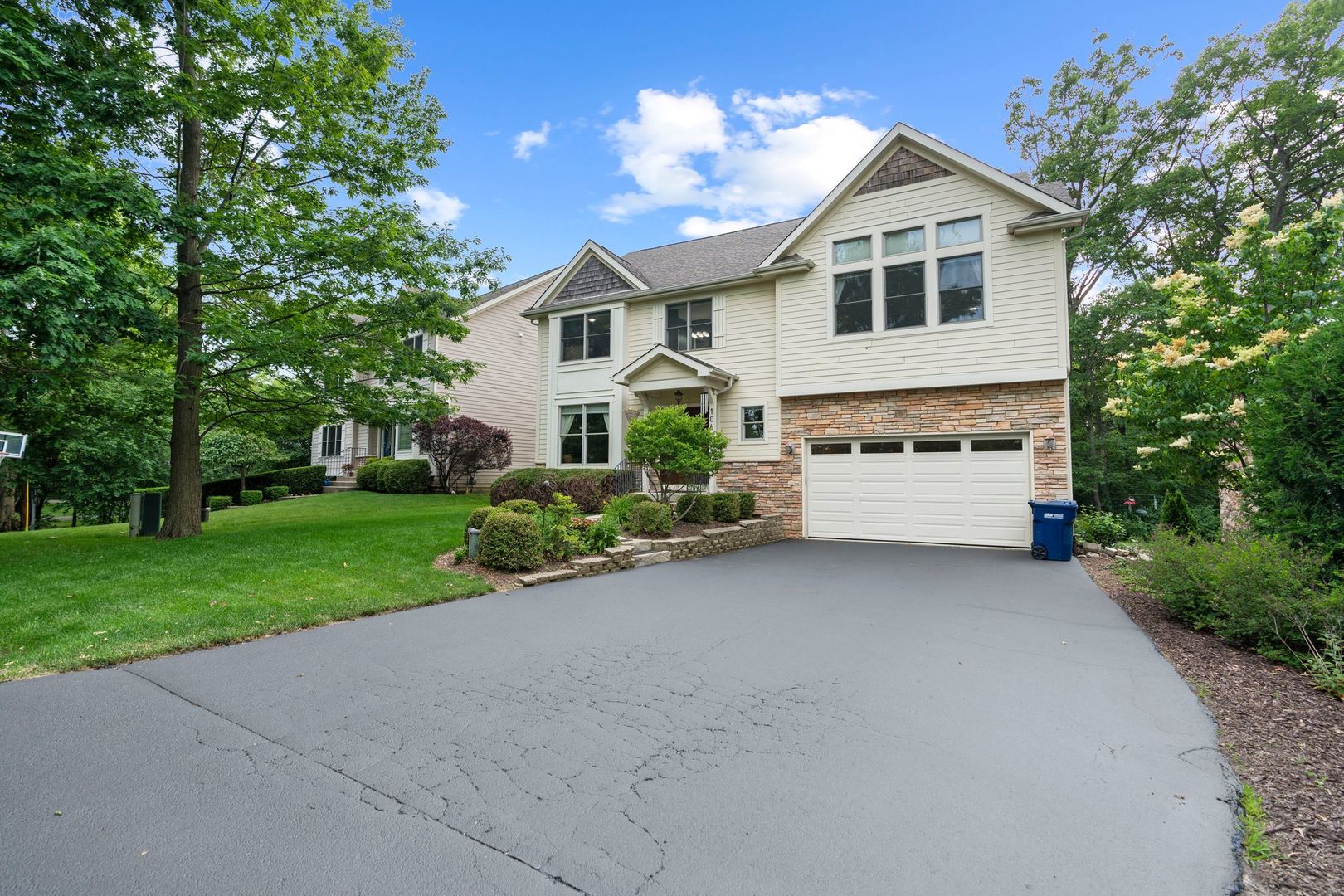 106 Forest View Drive Lake Bluff, IL 60044 - Photo 2 of 56 a front view of a house with a yard and trees