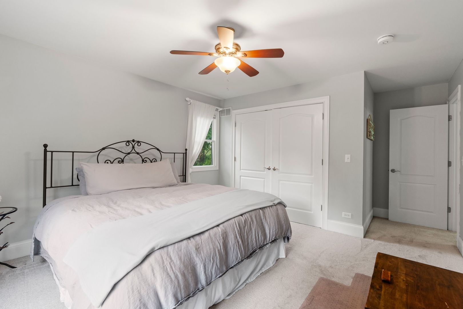 106 Forest View Drive Lake Bluff, IL 60044 - Photo 27 of 56 a bedroom with a bed and a chandelier