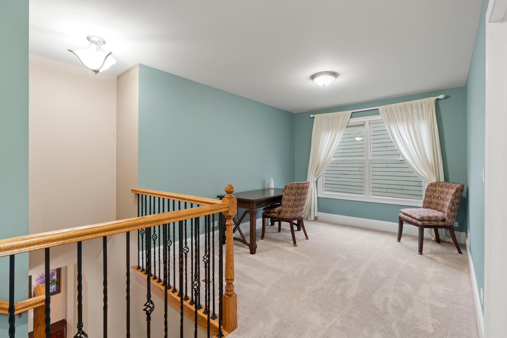 106 Forest View Drive Lake Bluff, IL 60044 - Photo 29 of 56 a view of a hallway with chairs and a window