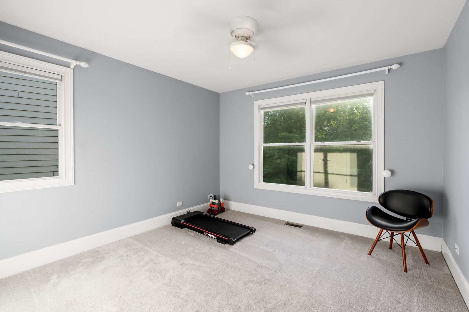 106 Forest View Drive Lake Bluff, IL 60044 - Photo 32 of 56 a living room with furniture and a large window