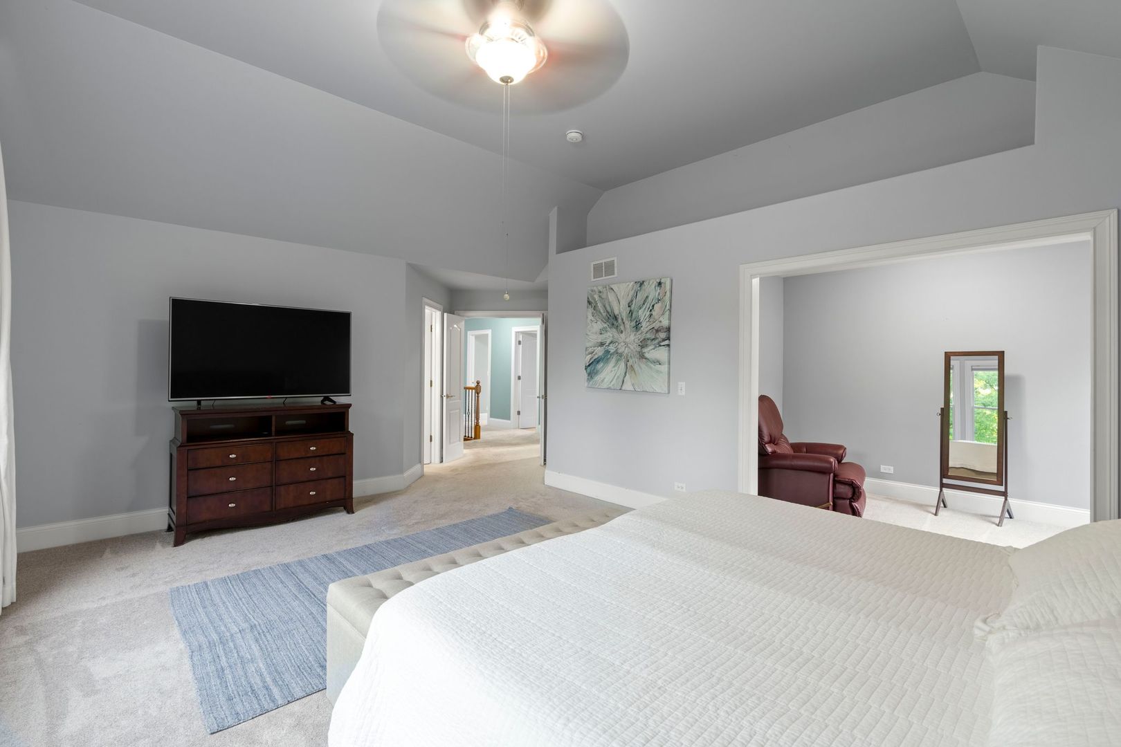 106 Forest View Drive Lake Bluff, IL 60044 - Photo 35 of 56 a bedroom with a bed and a flat screen tv