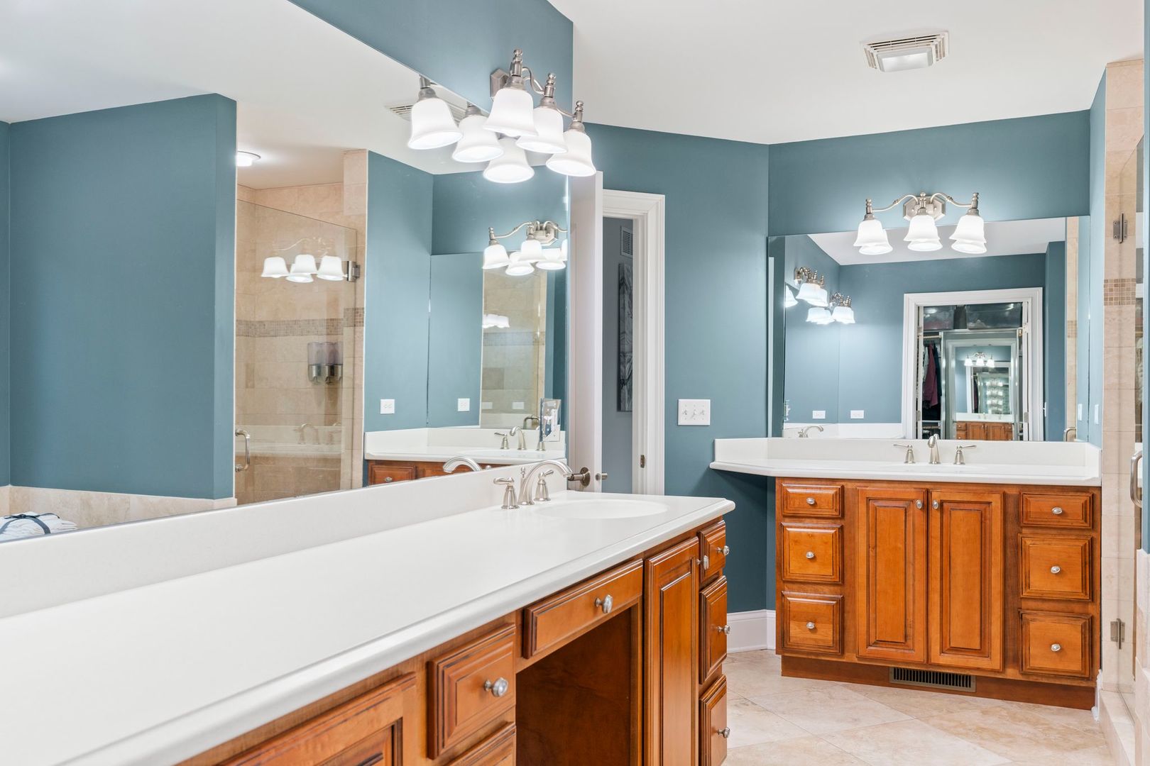 106 Forest View Drive Lake Bluff, IL 60044 - Photo 42 of 56 a bathroom with a sink double vanity and a mirror