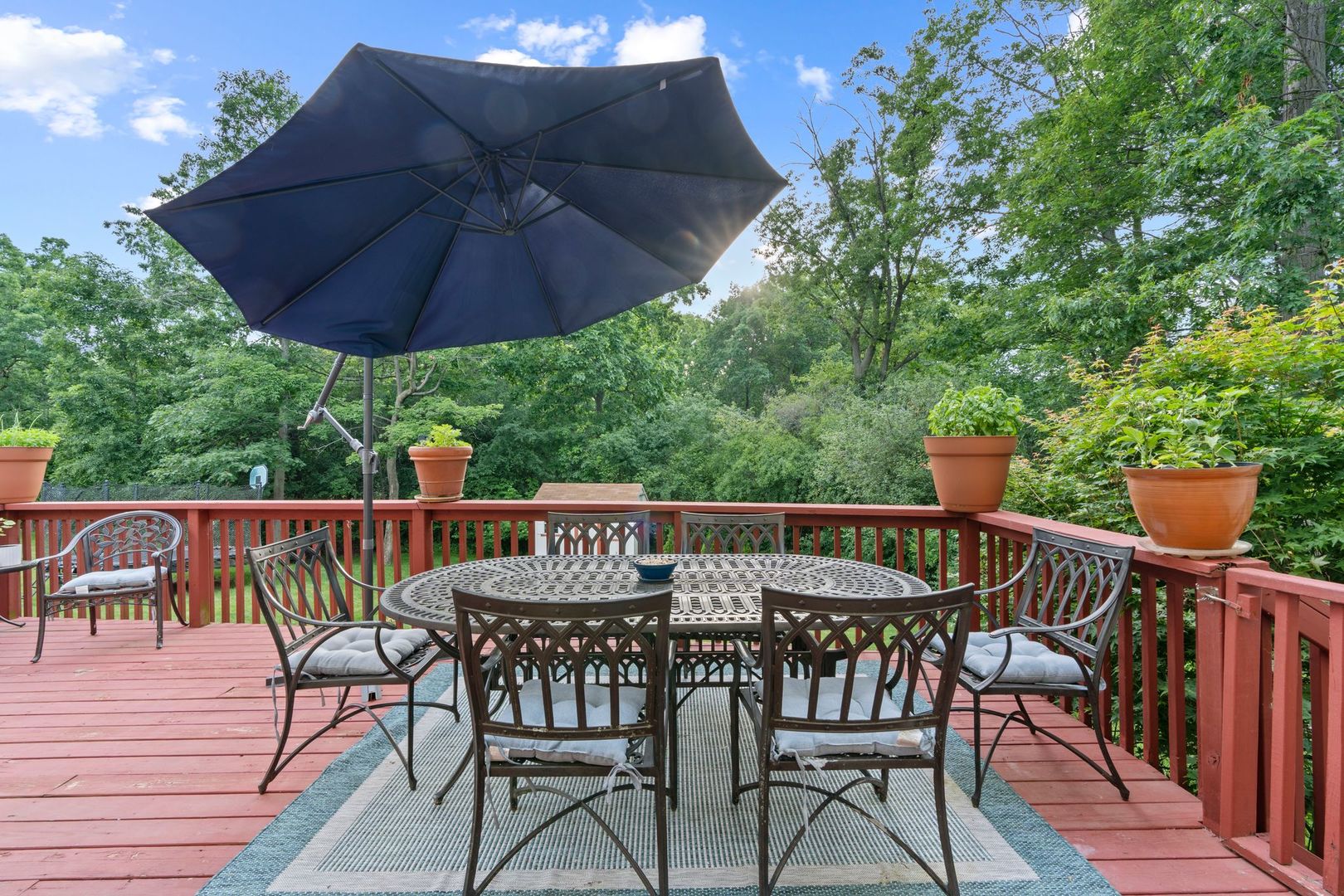 106 Forest View Drive Lake Bluff, IL 60044 - Photo 47 of 56 an outdoor space with furniture and umbrella