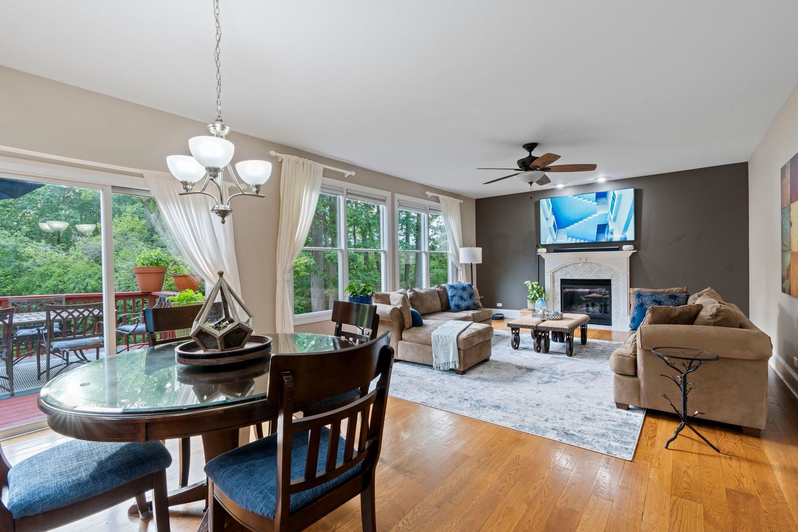 106 Forest View Drive Lake Bluff, IL 60044 - Photo 6 of 56 a living room with fireplace furniture and a large window