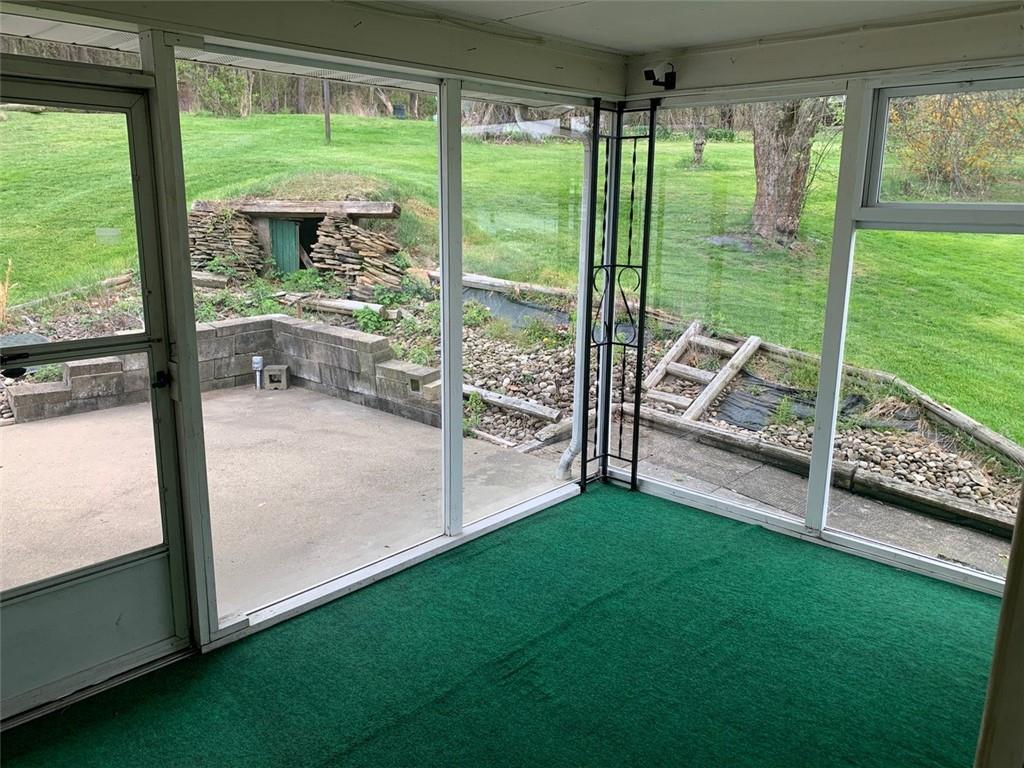 100 Main Street Home, PA 15747 - Photo 11 of 25 a view of backyard with large trees and plants