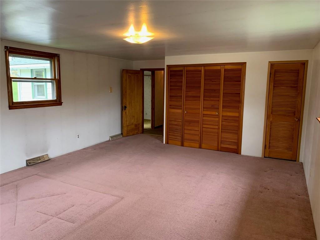 100 Main Street Home, PA 15747 - Photo 17 of 25 a view of an empty room with a window