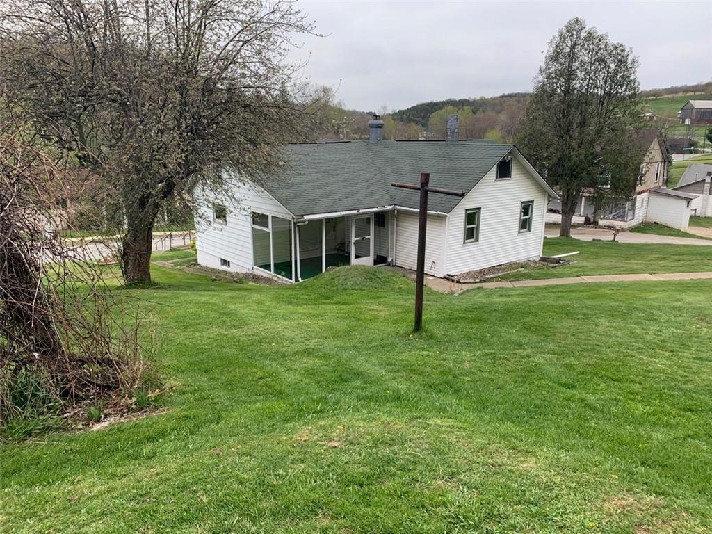 100 Main Street Home, PA 15747 - Photo 3 of 25 a view of a yard in front of house