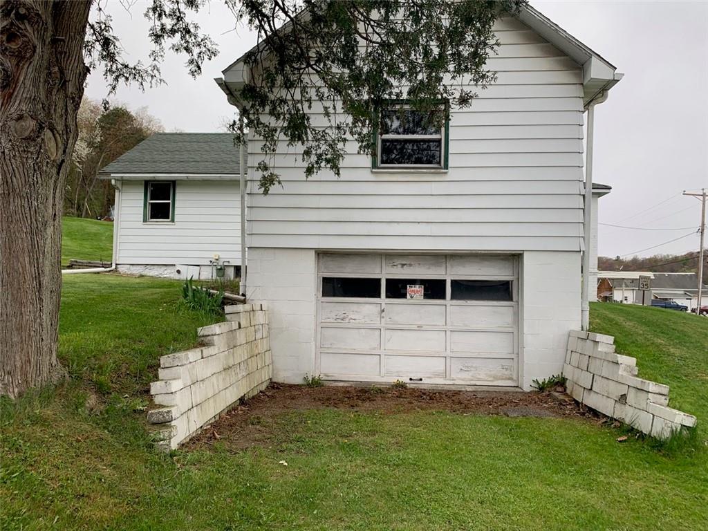 100 Main Street Home, PA 15747 - Photo 5 of 25 a view of a house with a yard