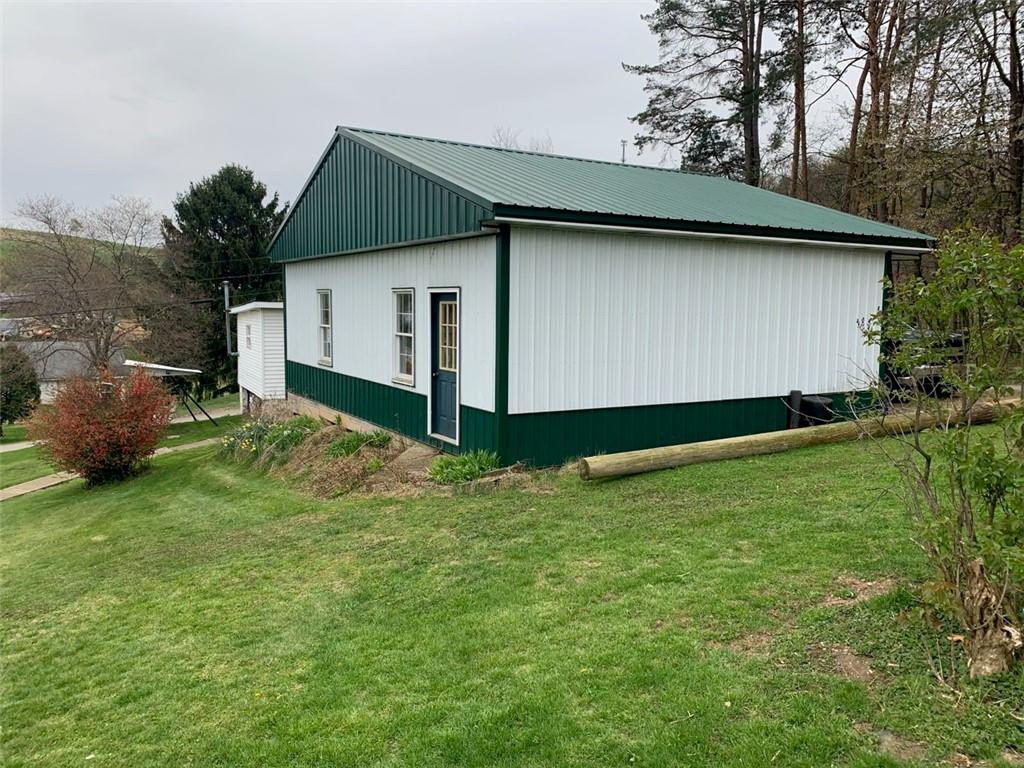 100 Main Street Home, PA 15747 - Photo 6 of 25 a backyard of a house
