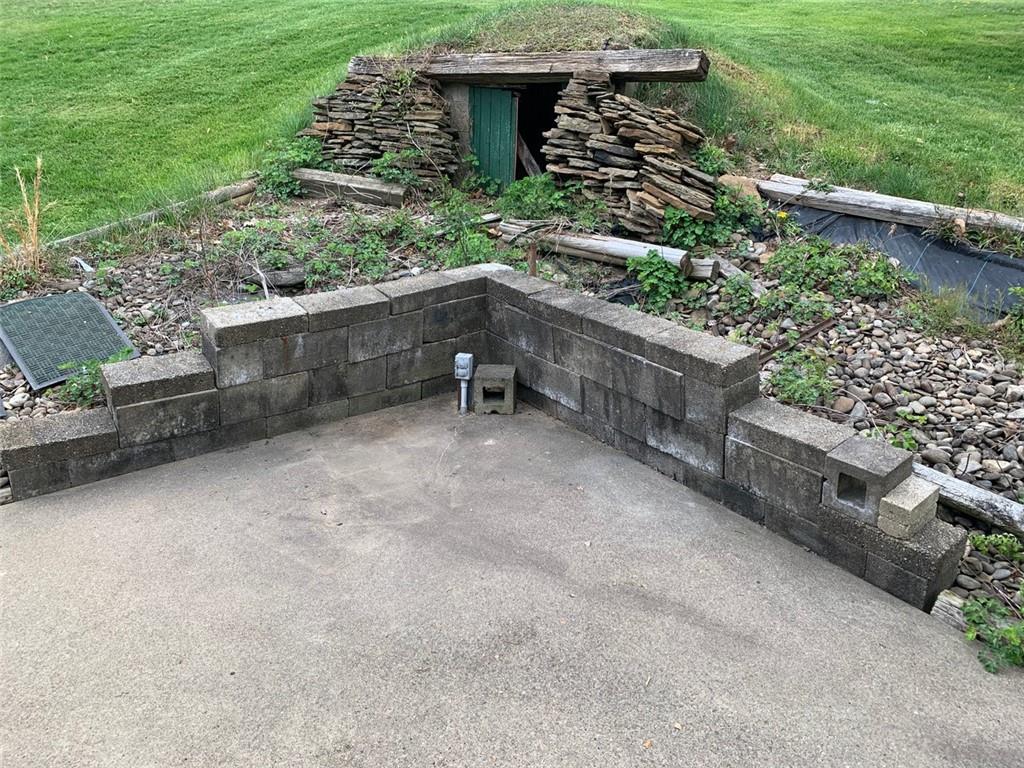 100 Main Street Home, PA 15747 - Photo 9 of 25 a backyard of a house with lots of green space