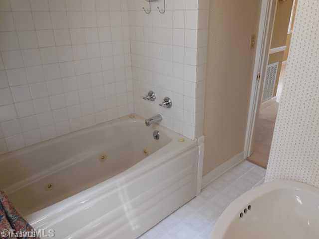 180 South Old Quarry Road Elkin, NC 28621 - Photo 11 of 16 Bath. The hall bath with a jetted tub.