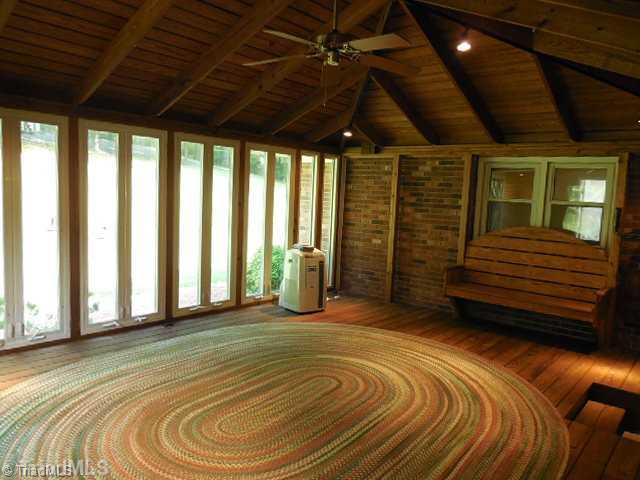 180 South Old Quarry Road Elkin, NC 28621 - Photo 13 of 16 Sunroom. This room is heated and cooled and is a delightful area for entertaining.