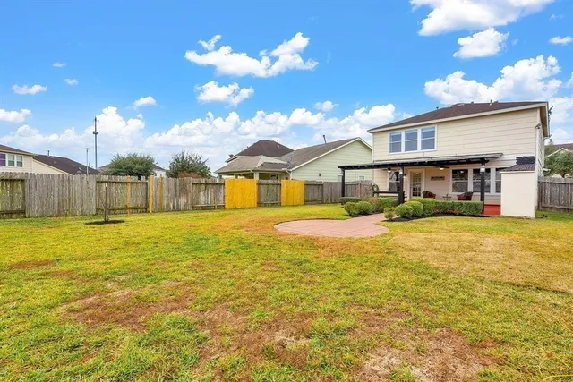 a view of a house with swimming pool