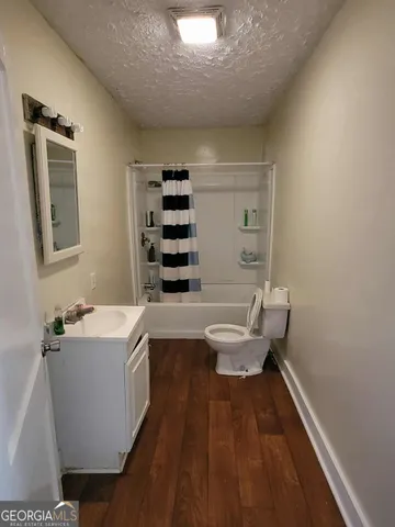 a bathroom with a sink and a bathtub