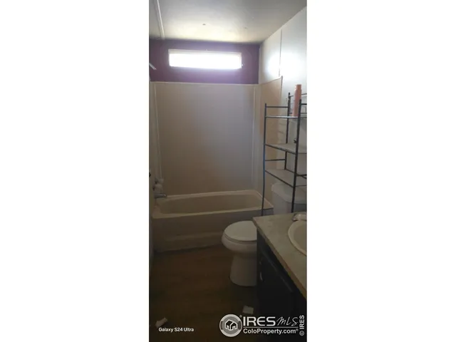 a bathroom with a toilet