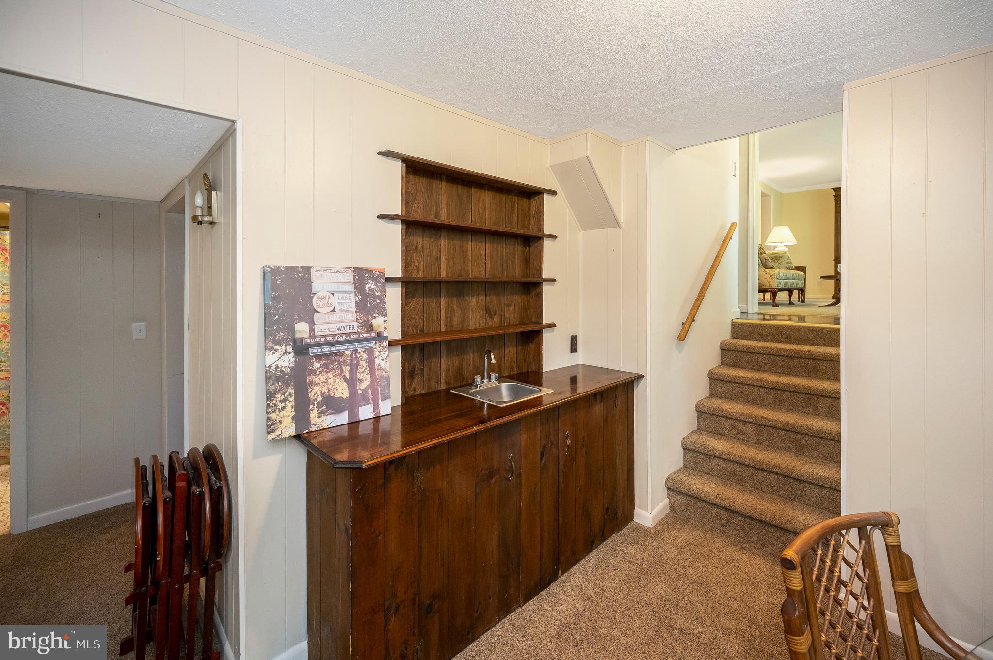115 Washington Street Locust Grove, VA 22508 - Photo 28 of 40 wet bar & steps to foyer