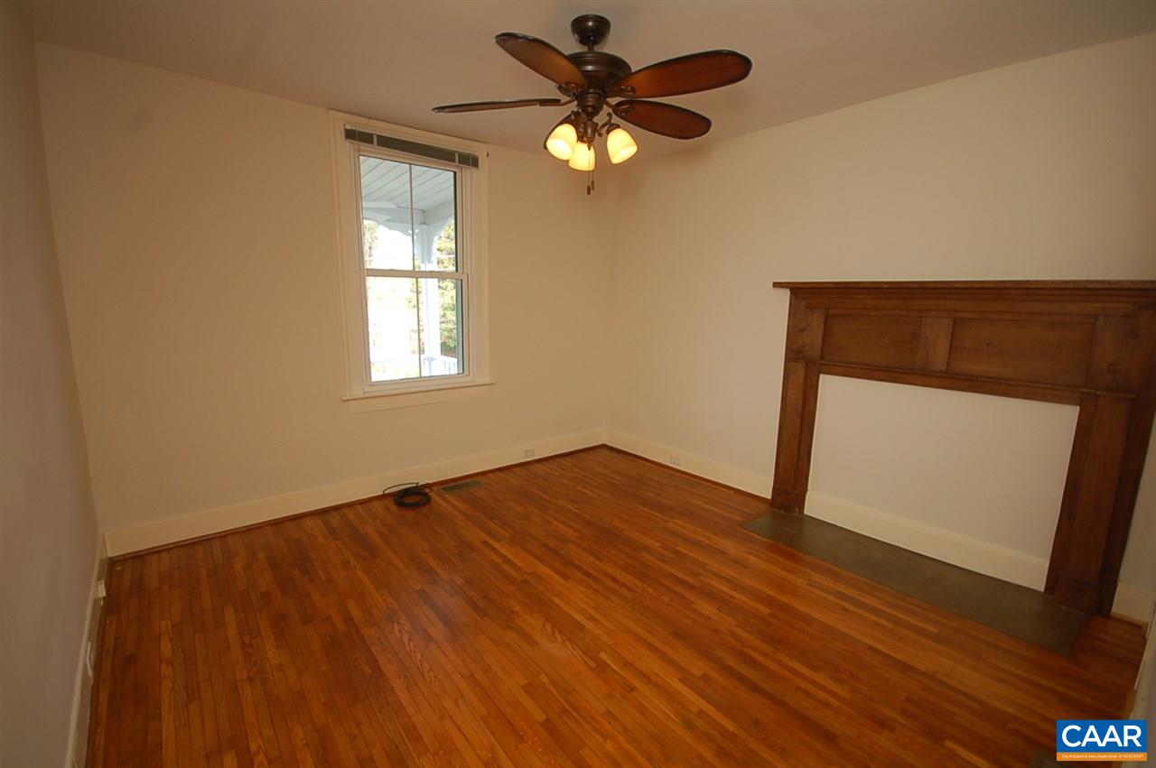 32 Madison Road Stanardsville, VA 22973 - Photo 13 of 50 a view of an empty room with a window and wooden floor