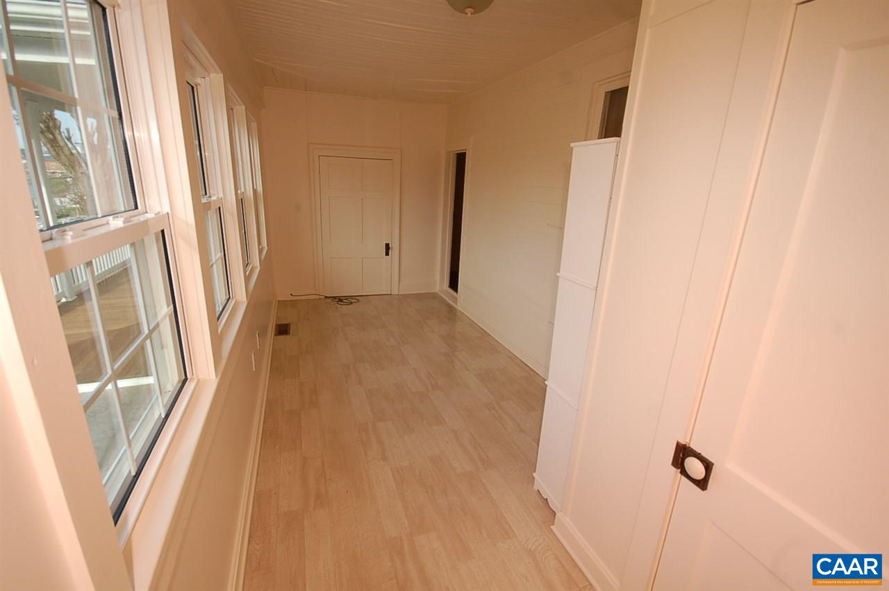 32 Madison Road Stanardsville, VA 22973 - Photo 16 of 50 a view of a room with wooden floor and door