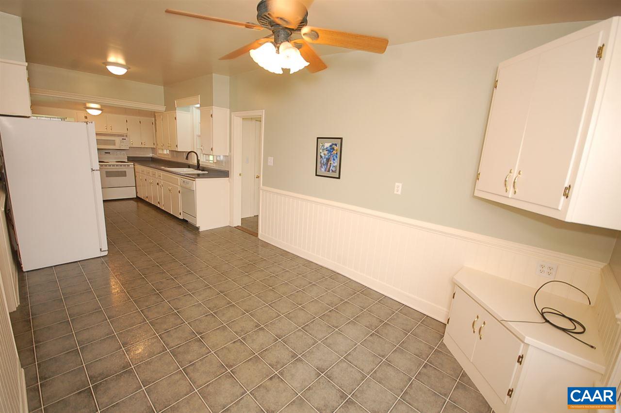 32 Madison Road Stanardsville, VA 22973 - Photo 17 of 50 a kitchen with stainless steel appliances a refrigerator and a stove top oven