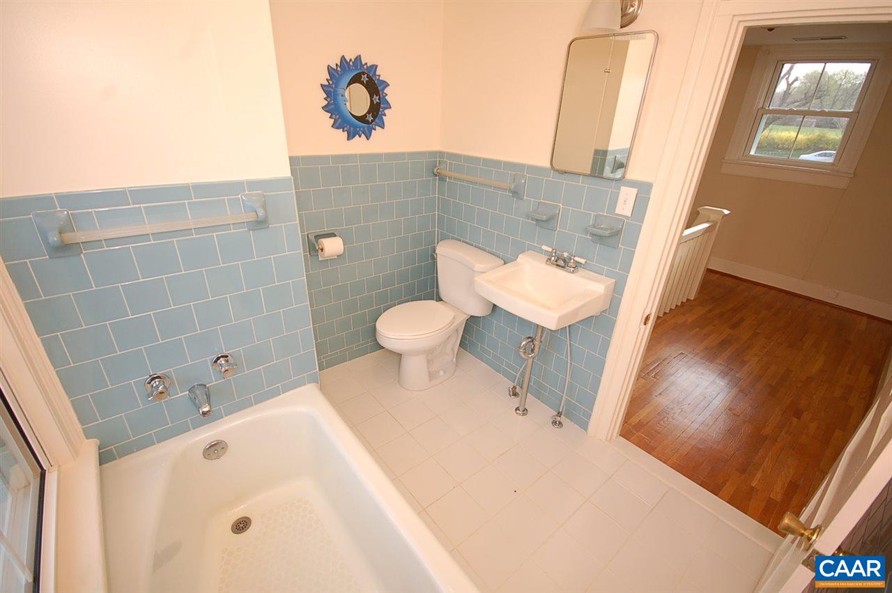 32 Madison Road Stanardsville, VA 22973 - Photo 24 of 50 a bathroom with a sink a toilet and shower