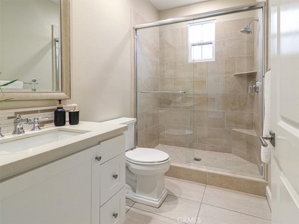 101 Omar Irvine, CA 92620 - Photo 13 of 42 a bathroom with a sink toilet and shower