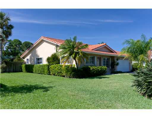 1966 Sharon Street Boca Raton, FL 33486 - Photo 4 of 17 a front view of a house with a yard