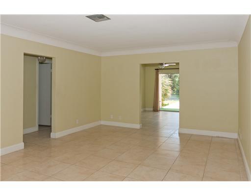 1966 Sharon Street Boca Raton, FL 33486 - Photo 9 of 17 a view of an empty room and window