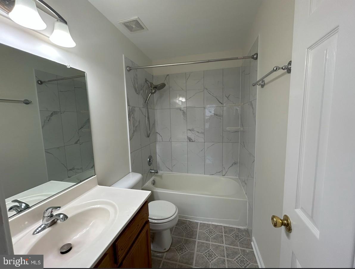 6443 McCoy Road Centreville, VA 20121 - Photo 18 of 28 Modern bathroom with elegant finishes.