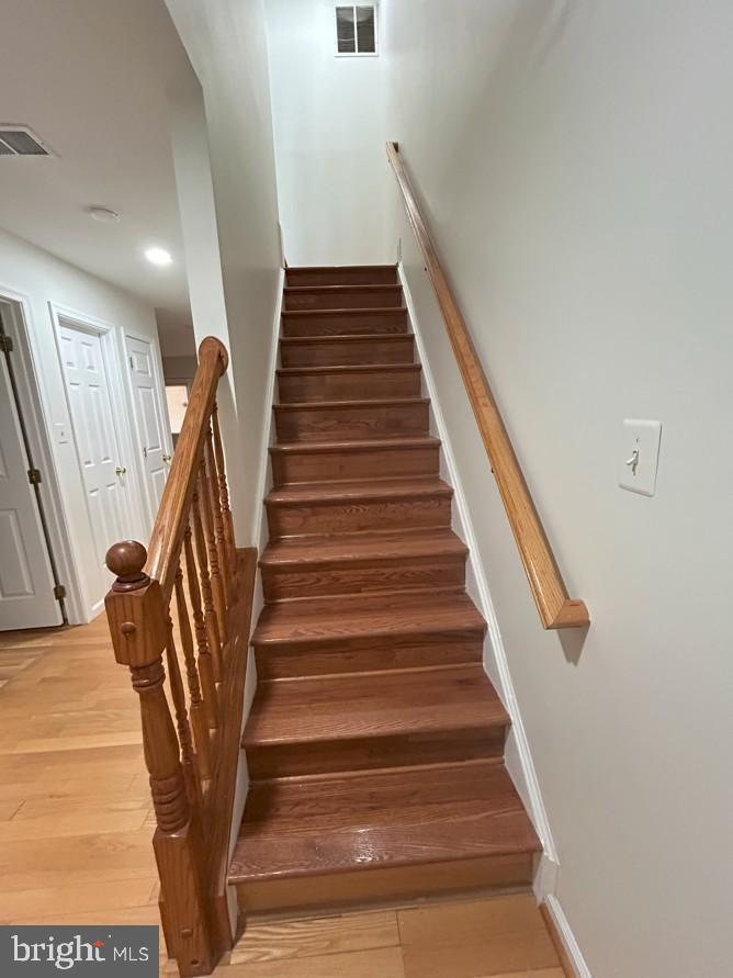 6443 McCoy Road Centreville, VA 20121 - Photo 19 of 28 Inviting staircase leading to new possibilities.