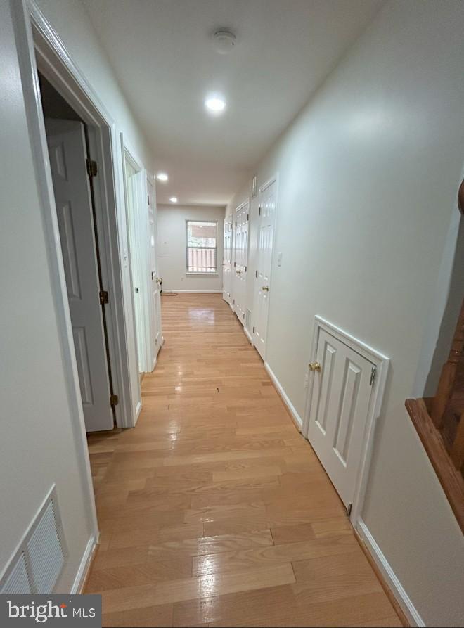 6443 McCoy Road Centreville, VA 20121 - Photo 20 of 28 Bright and inviting hallway with warm tones.