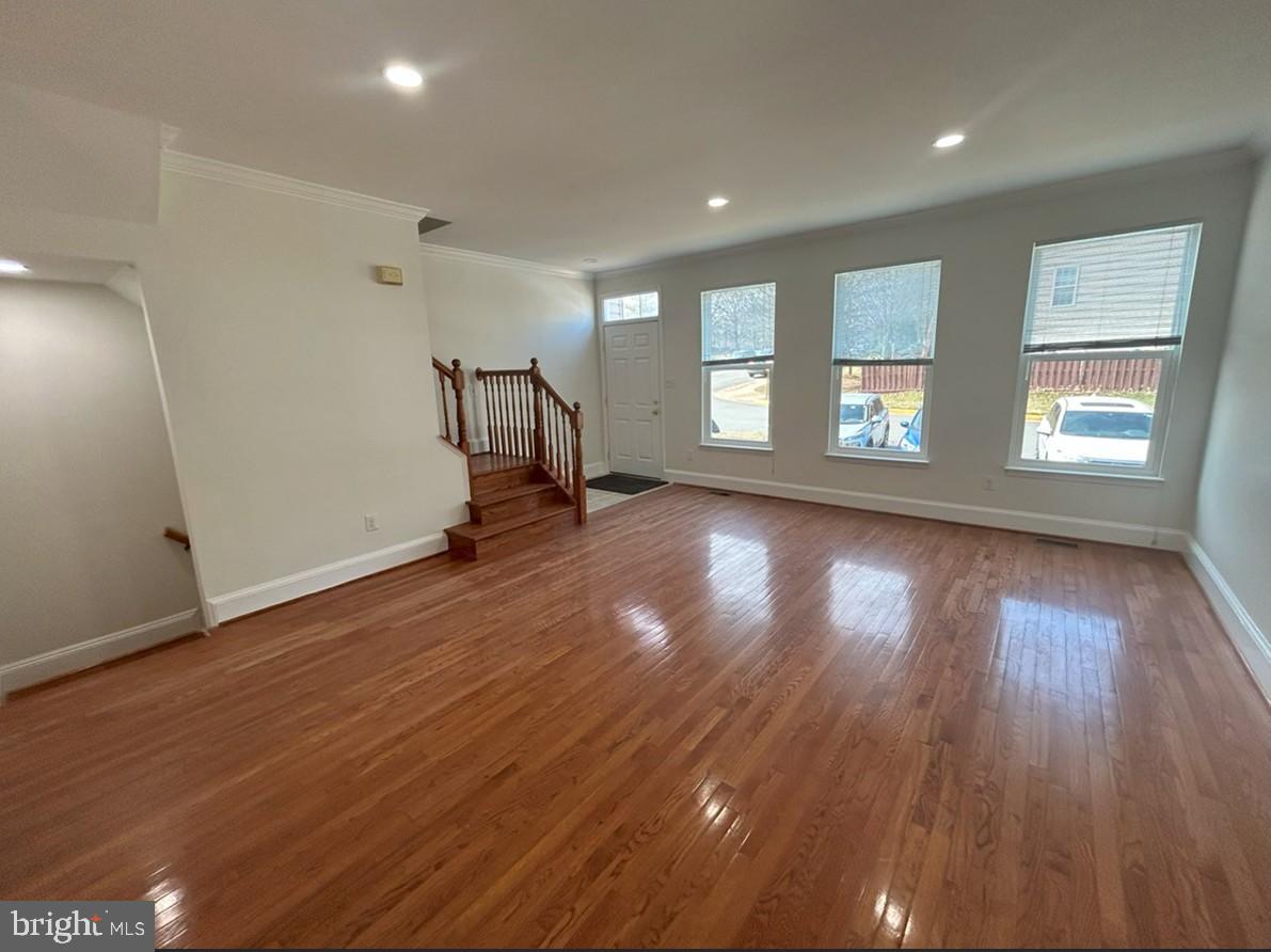 6443 McCoy Road Centreville, VA 20121 - Photo 3 of 28 Bright and airy living space with hardwood floors.
