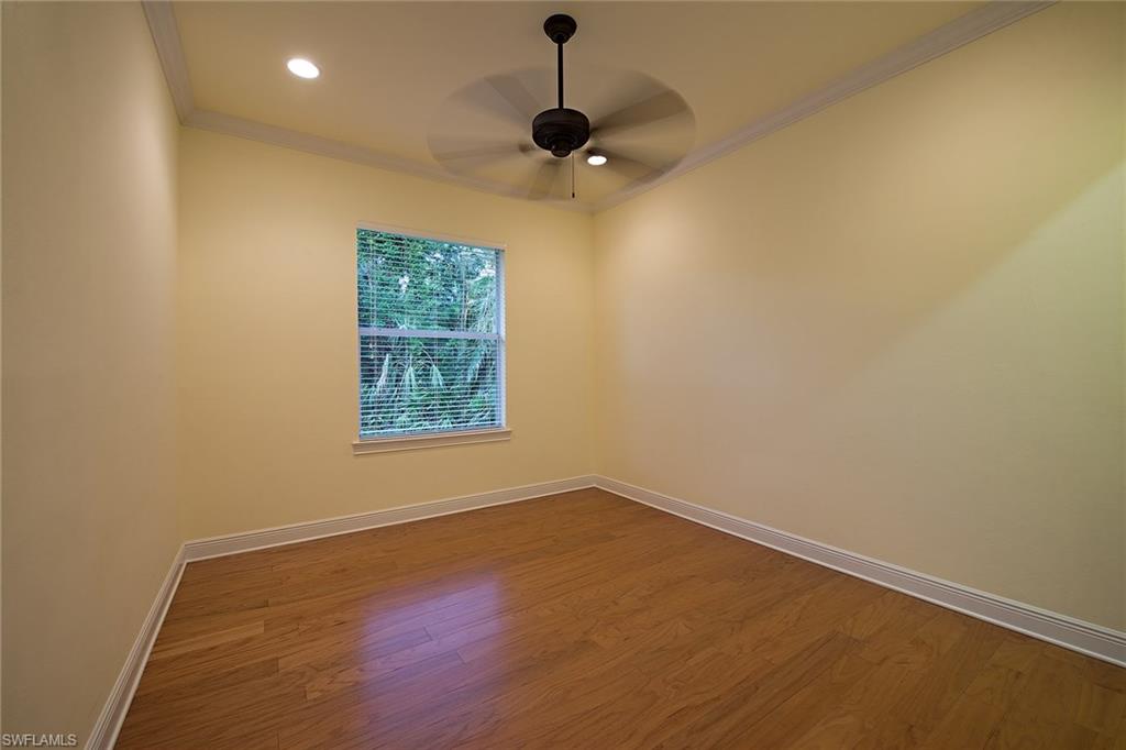 3883 North Road Naples, FL 34104 - Photo 15 of 20 a view of an empty room with a window