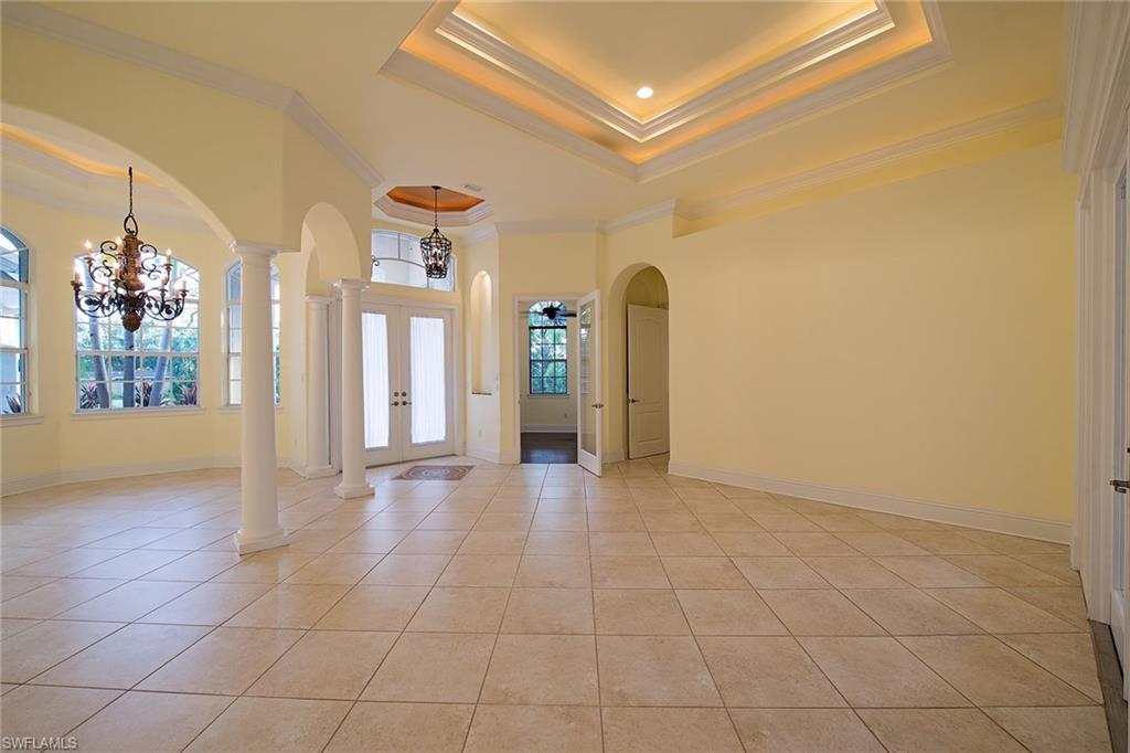 3883 North Road Naples, FL 34104 - Photo 2 of 20 a view of an empty room and a window